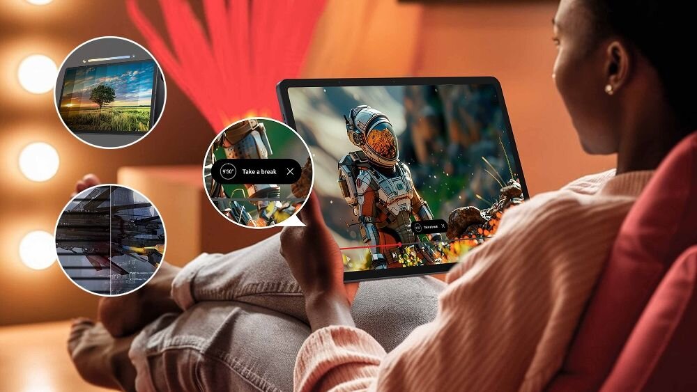 Osoba trzyma tablet, na którym wyświetlany jest obraz astronauty w kolorowym otoczeniu. Wokół tabletu widoczne są trzy okrągłe miniatury z różnymi obrazami, w tym jedna z napisem \'Take a break\'.