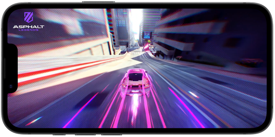 Na ekranie smartfona wyświetlana jest gra wyścigowa z samochodem jadącym po futurystycznym mieście. W lewym górnym rogu widoczne jest logo \'ASPHALT LEGENDS\'.