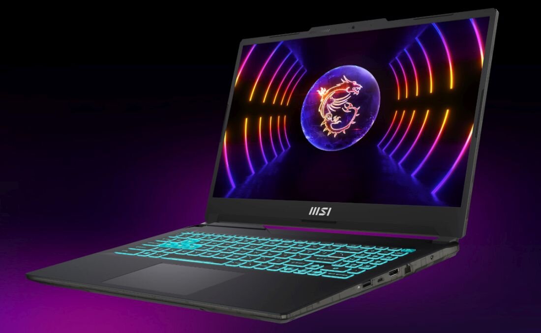 Laptop z podświetlaną klawiaturą i ekranem wyświetlającym kolorową grafikę z logo smoka. Na obudowie widoczne jest logo \'MSI\'.