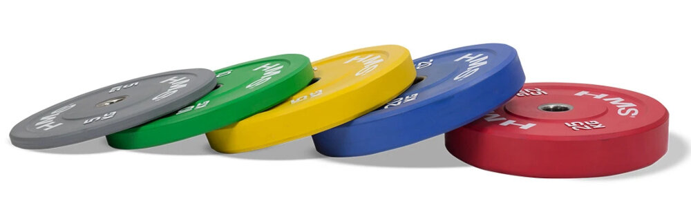 Obciążenie HMS CBR15 (15 kg) białe tło pięć talerz ułożonych na płasko lekko nachodzą jeden na drugim precyzyjny odlew i specjalne wyprofilowanie ograniczają kręcenie się talerza na gryfie wewnętrzna średnica 51 mm pewne osadzenie obciążenia bezpieczeństwo i efektywność ćwiczeń