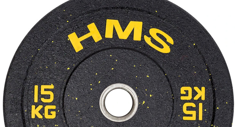 Obciążenie HMS HTBR15 (15 kg) białe tło zbliżenie na oznaczenie wagi kalibrowane wagowo i wymiarowo w granicach od -1% do +1% rzeczywista masa pozostaje bardzo bliska deklarowanej wartości 15 kg większa kontrola i powtarzalność wyników bardziej świadomy rozwój siły lepsze monitorowanie postępów w treningu wyraźne oznaczenie masy na powierzchni