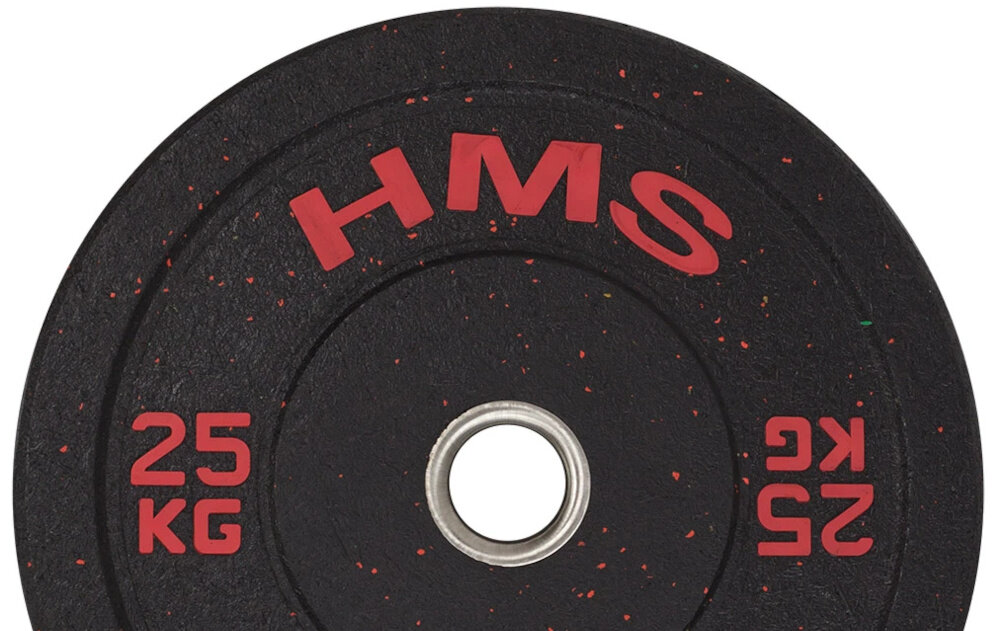 Obciążenie HMS HTBR25 (25 kg) białe tło zbliżenie na oznaczenie wagi kalibrowane wagowo i wymiarowo w granicach od -1% do +1% rzeczywista masa pozostaje bardzo bliska deklarowanej wartości 25 kg większa kontrola i powtarzalność wyników bardziej świadomy rozwój siły lepsze monitorowanie postępów w treningu wyraźne oznaczenie masy na powierzchni