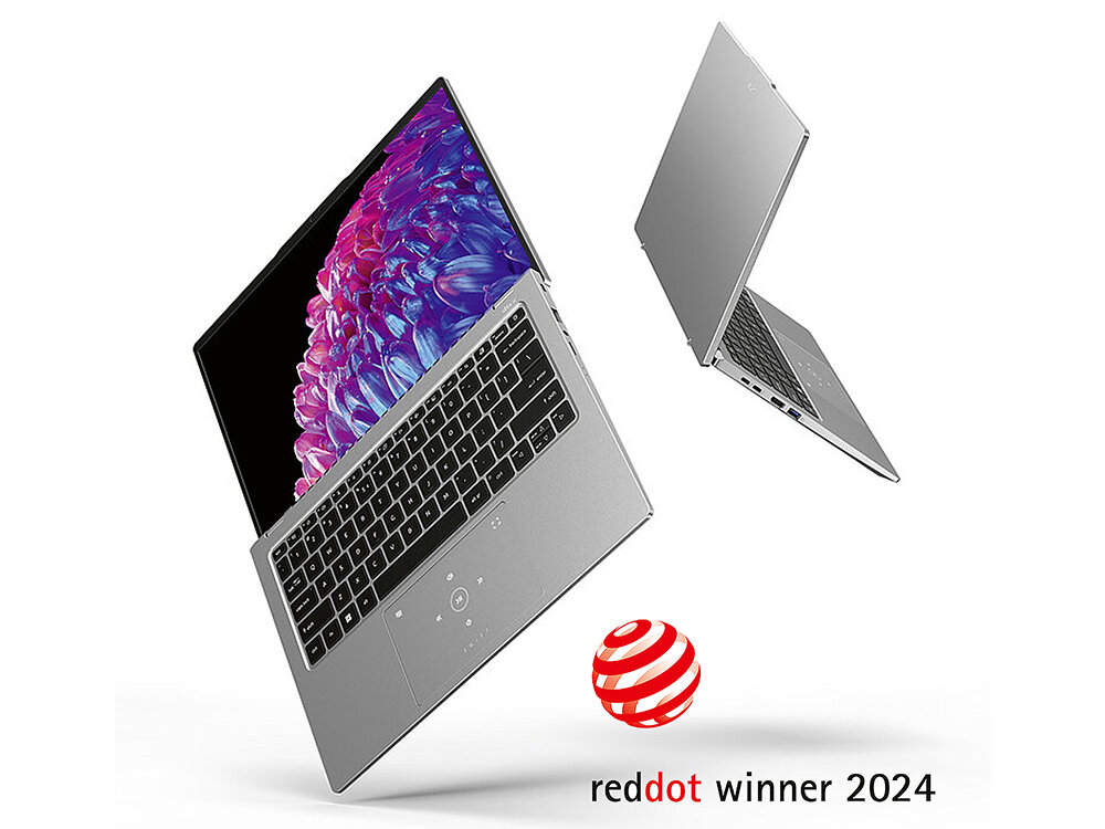 Dwa srebrne laptopy z otwartymi ekranami, jeden z widoczną klawiaturą i kolorowym wyświetlaczem. Na dole znajduje się logo \'reddot winner 2024\'.