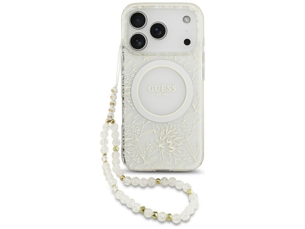 Białe etui na telefon z kwiatowym wzorem i napisem \'GUESS\' na okrągłym elemencie. Do etui przymocowany jest pasek z perełkami i złotymi akcentami.