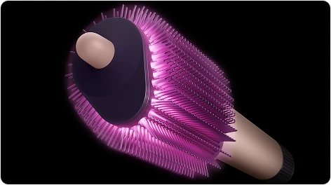 Urządzenie Dyson Airsmooth z zaznaczonym włosiem szczotki