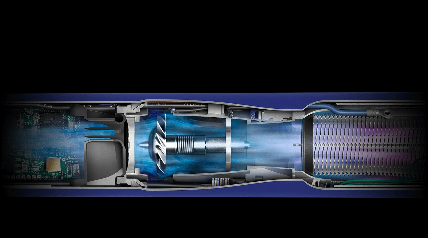 Przekrój przez rączkę multistylera Dyson Airwrap pokazuje wewnętrzną budowę oraz silnik podczas pracy.
