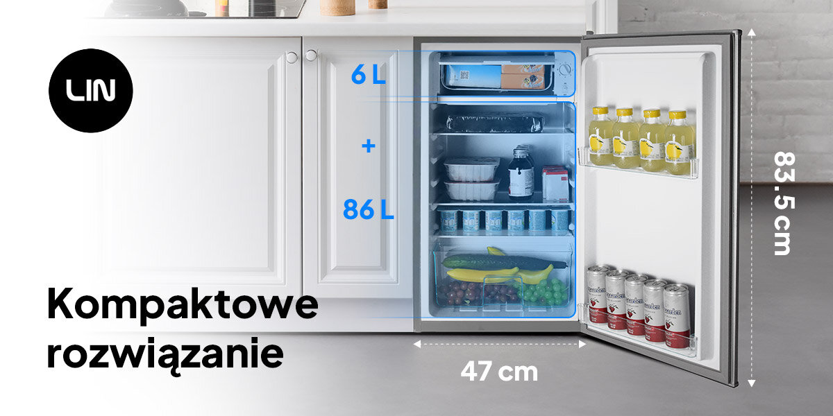 Obraz przedstawia otwartą lodówkę z napisem \'LIN\' oraz tekstem \'Kompaktowe rozwiązanie\'. Wymiary lodówki to 83.5 cm wysokości i 47 cm szerokości, a pojemność to 6 L + 86 L.