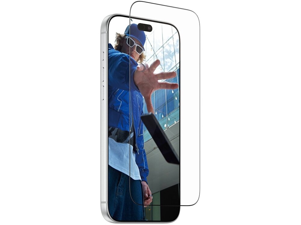 Obraz przedstawia smartfon z nałożonym szkłem hartowanym, na ekranie widoczna jest osoba w niebieskiej kurtce i okularach przeciwsłonecznych. Szkło jest przezroczyste i dopasowane do kształtu ekranu.