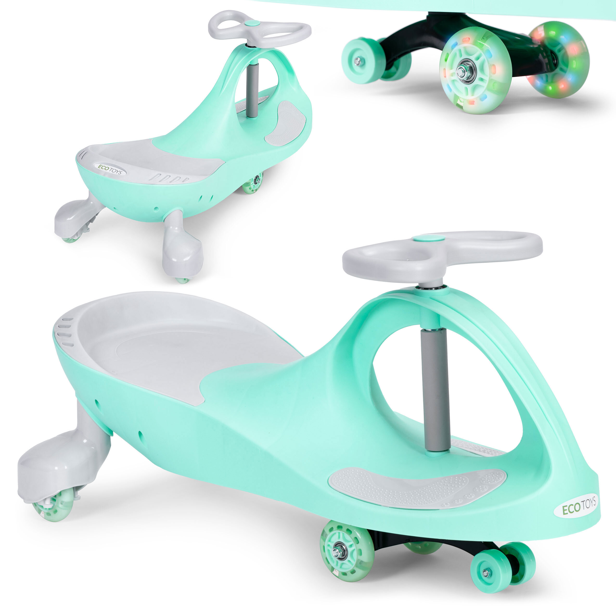 Na obrazie widoczny jest zielony jeździk grawitacyjny dla dzieci z szarymi elementami i kołami LED. Na produkcie znajduje się logo \'ECOTOYS\'.
