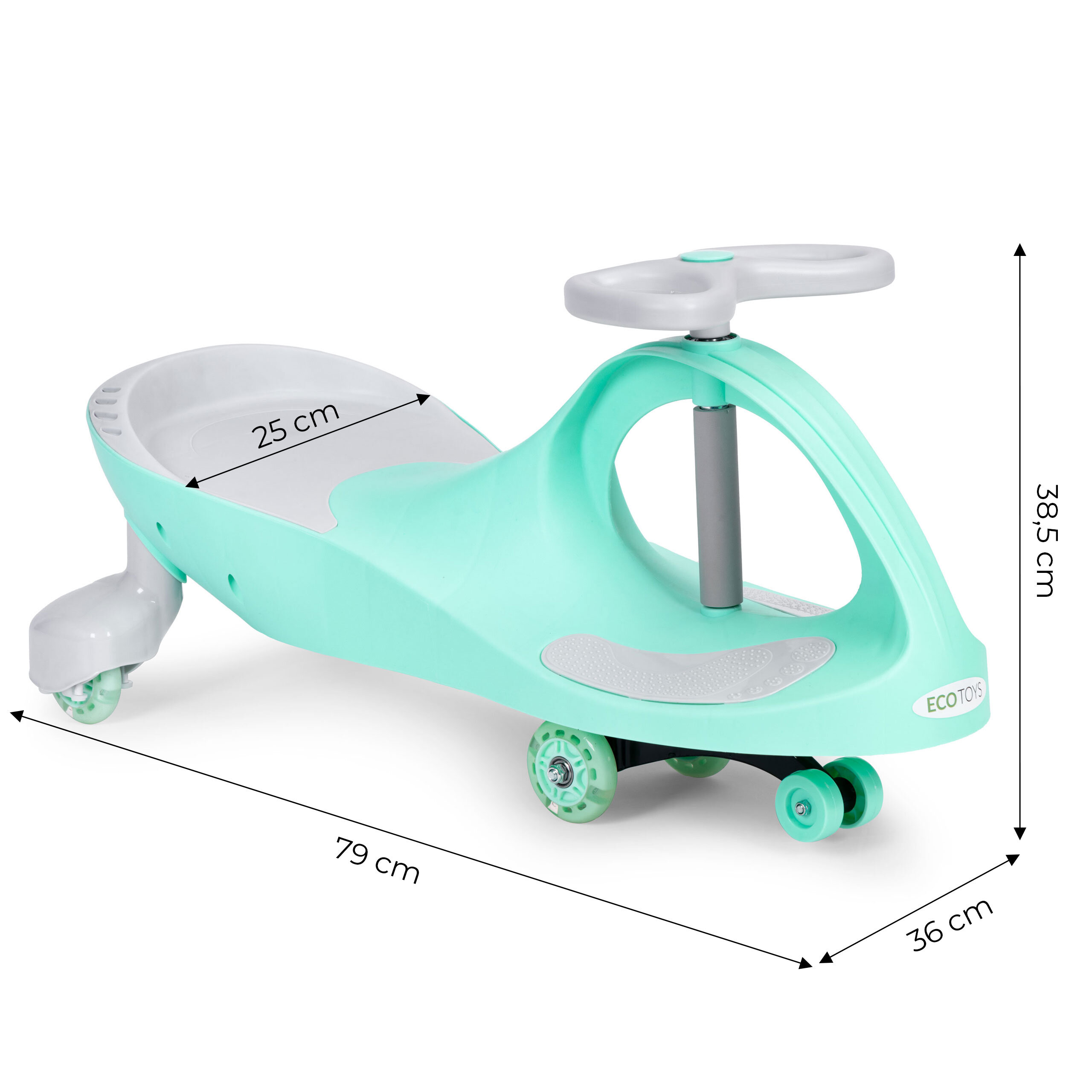 Jasnozielony jeździk grawitacyjny dla dzieci z szarymi elementami, posiada koła LED i oznaczenia wymiarów: 25 cm, 79 cm, 36 cm, 38.5 cm. Na przodzie widoczne jest logo \'ECOTOYS\'.