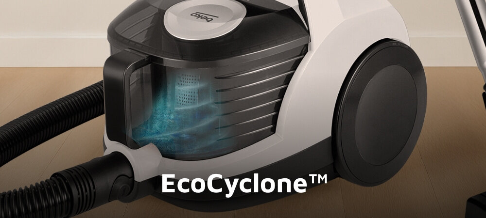 Odkurzacz z widocznym logo \'beko\' na górze, z przezroczystym pojemnikiem na kurz i napisem \'EcoCyclone™\' na dole. Urządzenie stoi na drewnianej podłodze.