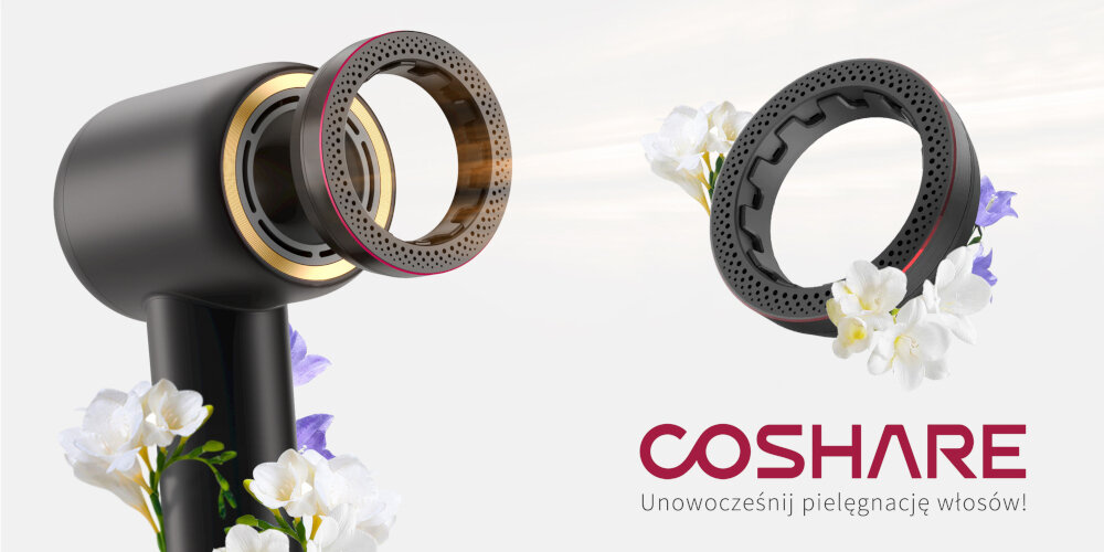Obraz przedstawia czarną suszarkę do włosów z wymiennym elementem, ozdobioną białymi kwiatami. Widoczny jest napis \'COSHARE Unowocześnij pielęgnację włosów!\'.