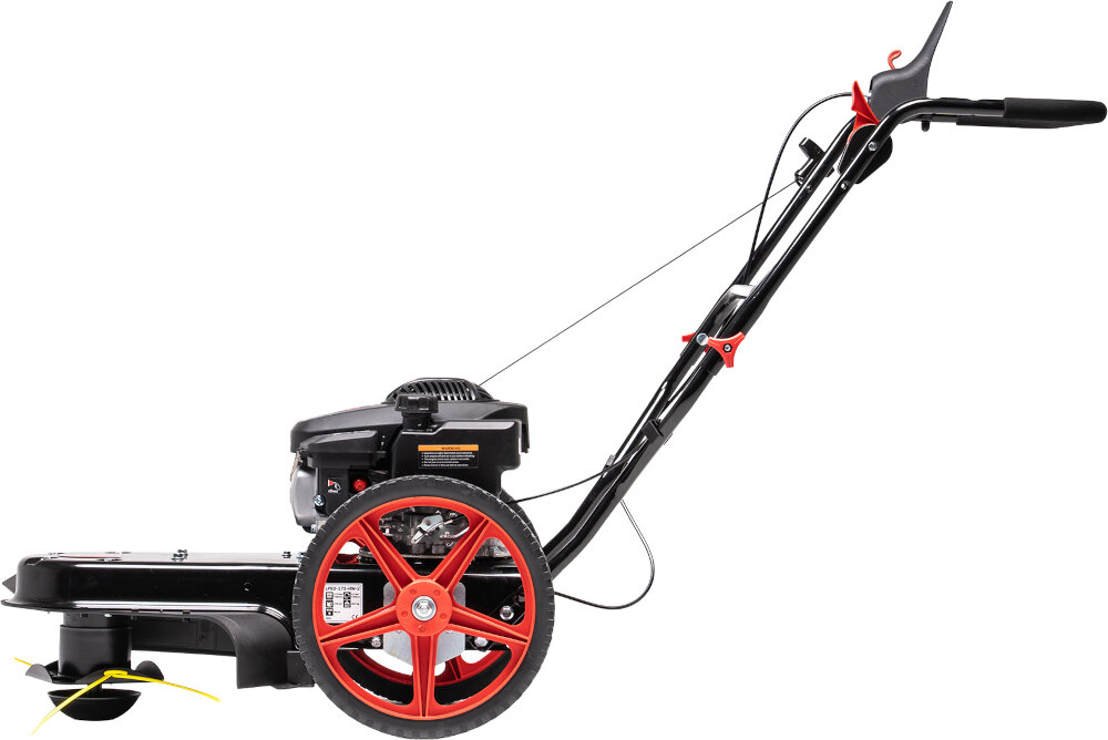 Na obrazie widoczna jest kosiarka spalinowa z dużymi czerwonymi kołami i czarną obudową. Kosiarka posiada uchwyt z czarnymi rączkami i widoczne elementy mechaniczne.