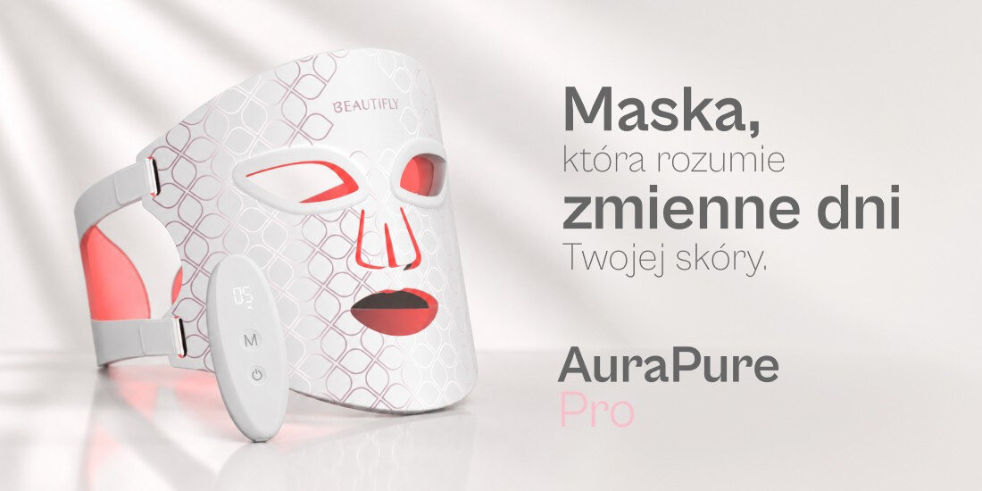 Na obrazie widoczna jest biała maska LED z czerwonymi elementami i napisem \'BEAUTIFLY\'. Obok maski znajduje się tekst: \'Maska, która rozumie zmienne dni Twojej skóry. AuraPure Pro\'.