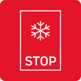 Czerwony znak z białą śnieżynką i napisem \'STOP\'.