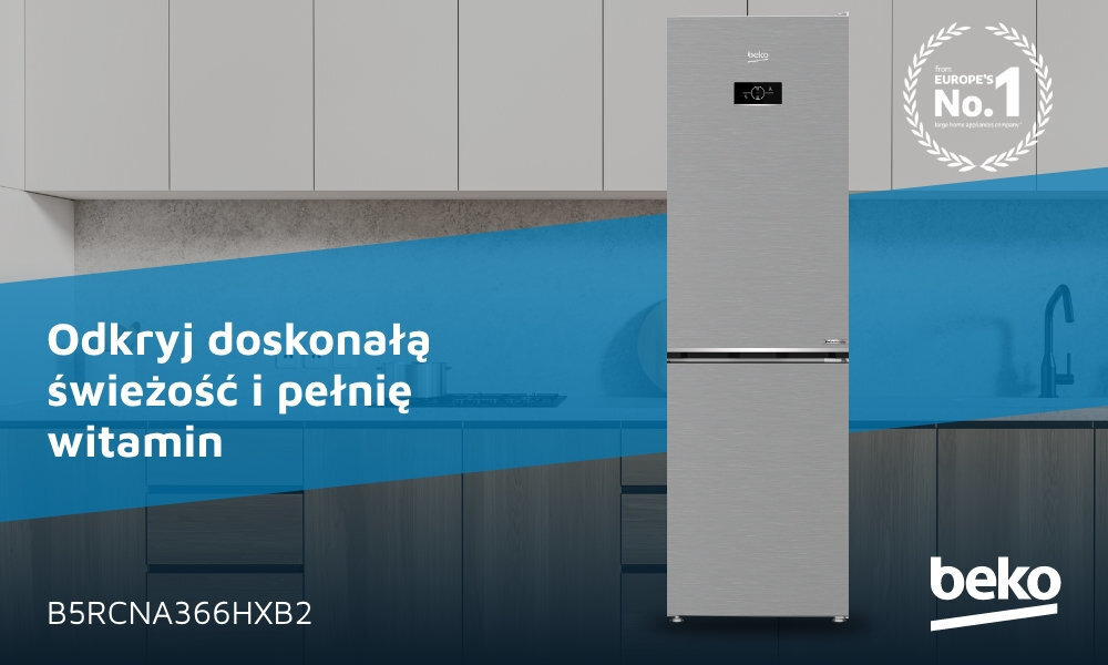 Na obrazie znajduje się lodówka w kolorze inox, z wyświetlaczem na drzwiach. Widoczny jest tekst: \'Odkryj doskonałą świeżość i pełnię witamin\', \'B5RCNA366HXB2\', oraz logo \'beko\'.