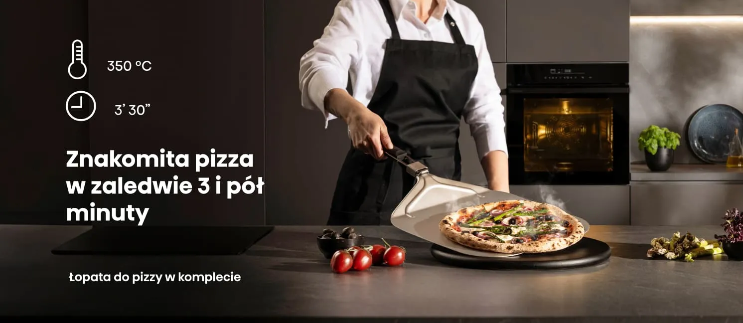 Osoba w fartuchu trzyma łopatę z pizzą, a w tle widać piekarnik. Tekst na obrazie: \'Znakomita pizza w zaledwie 3 i pół minuty\', \'350 °C\', \'3’ 30”\', \'Łopata do pizzy w komplecie\'.