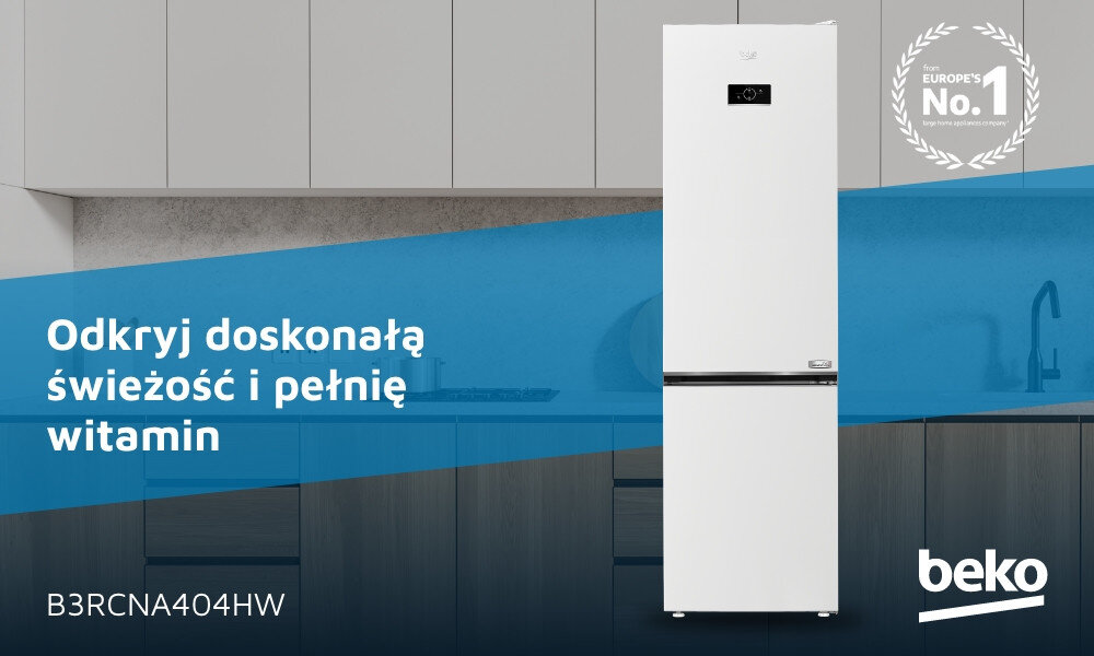Biała lodówka z wyświetlaczem na drzwiach, obok której znajduje się napis \'Odkryj doskonałą świeżość i pełnię witamin\'. W prawym dolnym rogu widoczne jest logo \'beko\'.