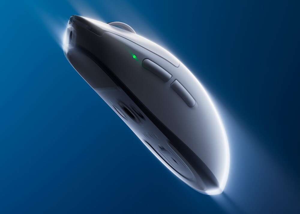 Mysz MCHOSE A7 V2 Ultra+ Mysz bezprzewodowa pokazana pod kątem, z podświetloną krawędzią boczną i zielonym wskaźnikiem diodowym w ruchu