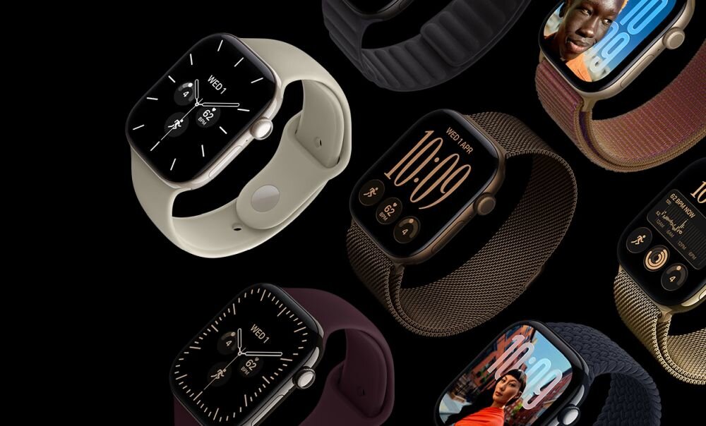 Na obrazie widoczne są różne modele smartwatchy z różnymi tarczami i paskami w różnych kolorach. Każdy zegarek ma wyświetlacz z różnymi informacjami, takimi jak godzina i data.
