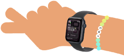 Smartwatch z ciemnym paskiem i wyświetlaczem pokazującym różne aplikacje. Widoczne kolorowe kółka z numerami od 1 do 5.