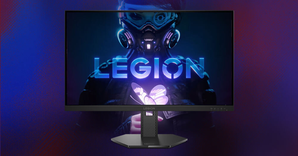 Monitor wyświetla grafikę przedstawiającą postać w masce z napisem \'LEGION\' oraz motylem w dłoniach. Logo \'LEGION\' znajduje się na dolnej ramce monitora.