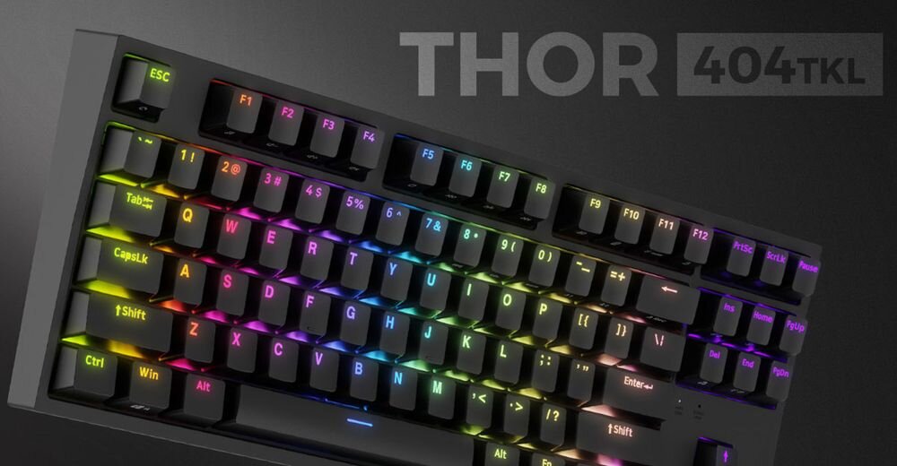 Klawiatura mechaniczna z podświetleniem RGB, widoczne klawisze funkcyjne i alfanumeryczne. Na obrazie znajduje się napis \'THOR 404 TKL\'.