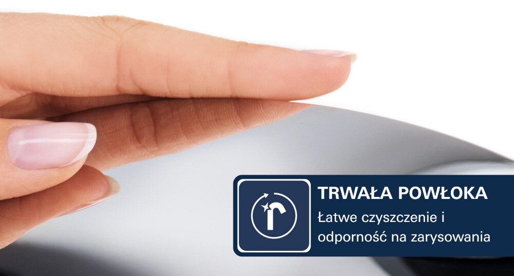 Dłoń dotyka powierzchni baterii umywalkowej. Obok znajduje się napis: \'TRWAŁA POWŁOKA Łatwe czyszczenie i odporność na zarysowania\'.