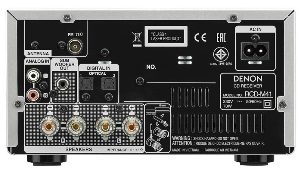 Tył amplitunera stereo z różnymi wejściami i wyjściami, w tym antena, subwoofer out, digital in optical oraz gniazda głośnikowe. Widoczny jest napis \'DENON CD RECEIVER MODEL NO. RCD-M41\' oraz ostrzeżenia dotyczące bezpieczeństwa.