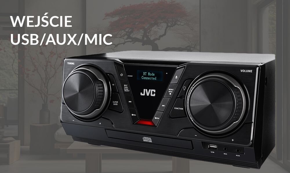 Czarna wieża audio JVC z dużymi pokrętłami i wyświetlaczem pokazującym \'BT Mode Connected\'. Obok urządzenia widoczny jest napis \'WEJŚCIE USB/AUX/MIC\'.