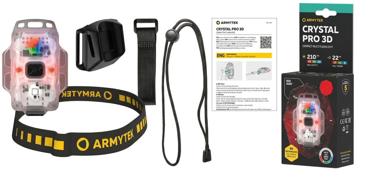Na obrazie znajduje się latarka uniwersalna z przezroczystą obudową, opaska z napisem \'ARMYTEK\', uchwyt, pasek oraz instrukcja obsługi. Obok widoczne jest opakowanie z napisem \'ARMYTEK CRYSTAL PRO 3D\'.
