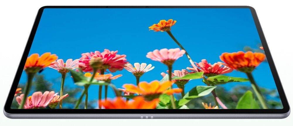 Tablet z wyświetlaczem pokazującym kolorowe kwiaty na tle błękitnego nieba. Urządzenie ma cienkie ramki i metaliczną obudowę.