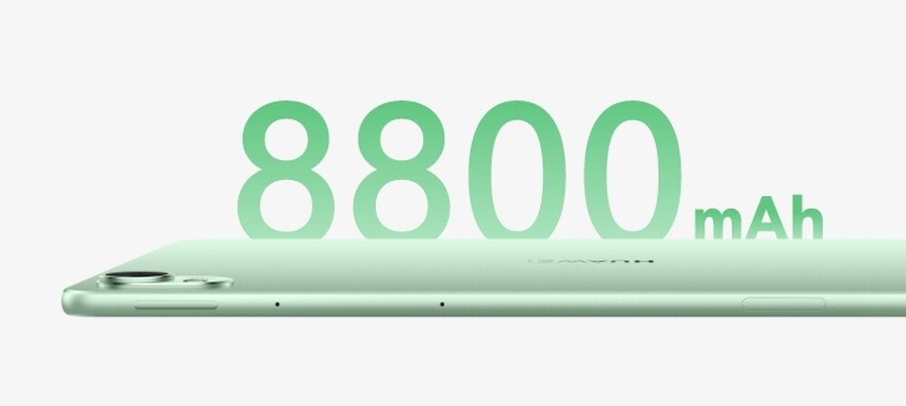 Obraz przedstawia zielony tablet z widocznym napisem \'8800 mAh\' w tle. Tablet jest pokazany z boku, ukazując jego smukły profil i aparat fotograficzny.
