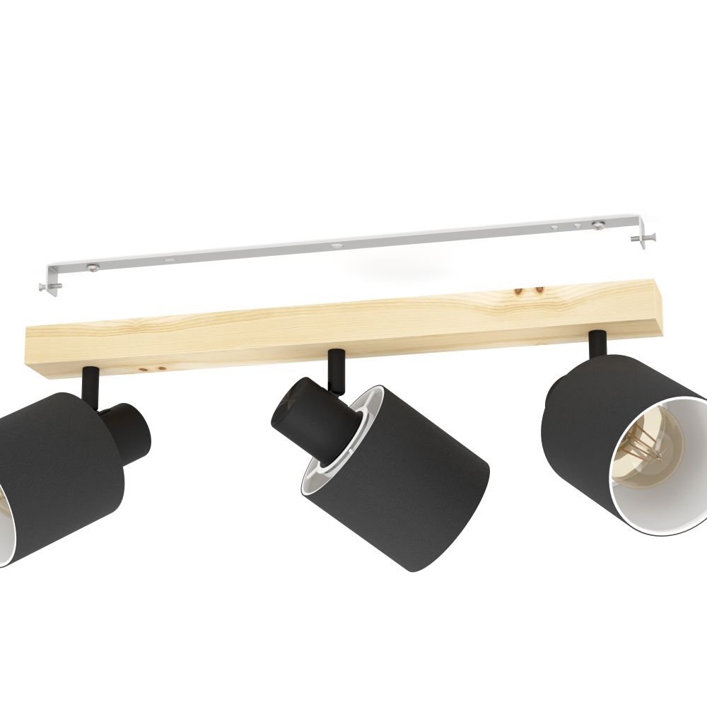 Lampa reflektorowa z trzema czarnymi kloszami zamontowanymi na drewnianej listwie. Klosze są skierowane w różnych kierunkach, a wewnątrz jednego z nich widoczna jest żarówka.