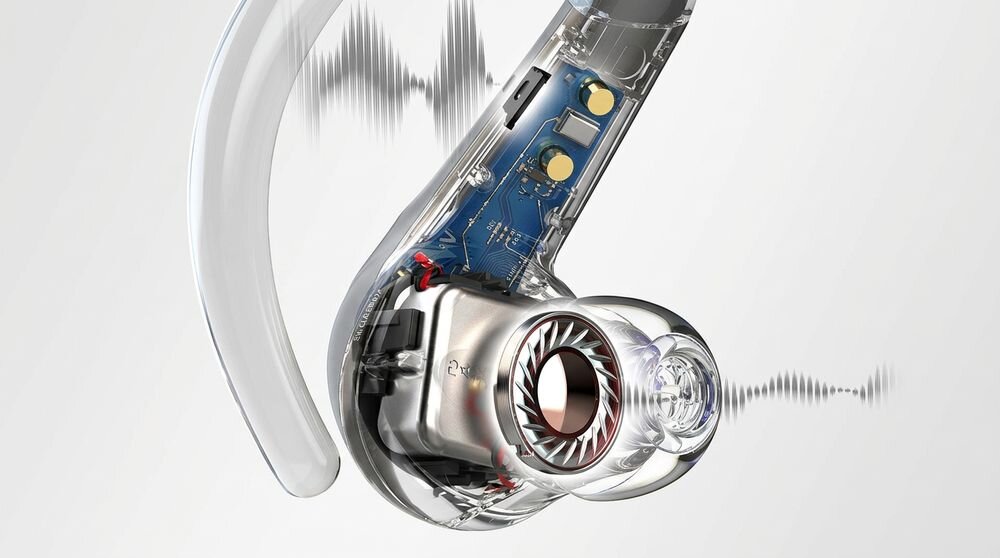 Obraz przedstawia przezroczysty przekrój słuchawki dokanałowej, ukazujący wewnętrzne komponenty elektroniczne i mechaniczne. W tle widoczne są fale dźwiękowe.