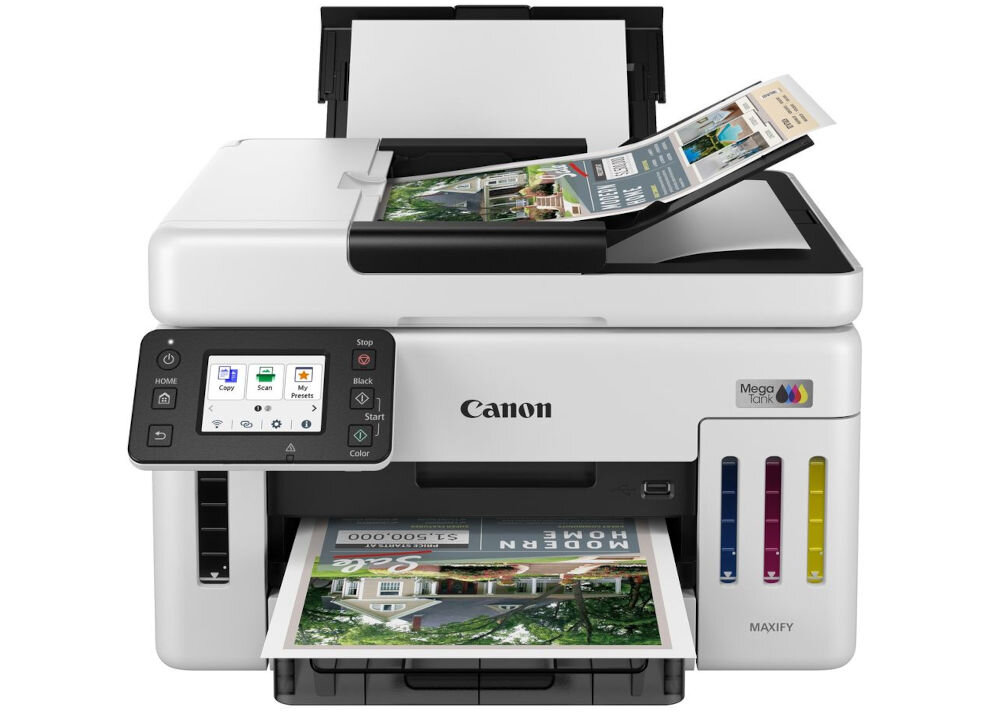 Urządzenie wielofunkcyjne Canon z wyświetlaczem i panelem sterowania, drukujące kolorowe dokumenty. Widoczne są pojemniki na tusz oraz logo Canon i MegaTank.