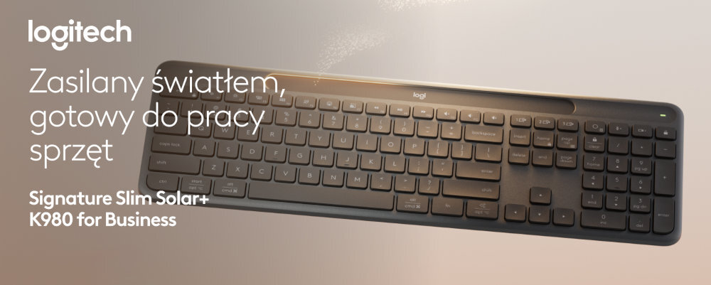 Na obrazie widoczna jest klawiatura z logo \'logi\' na górze. Tekst na obrazie: \'logitech Zasilany światłem, gotowy do pracy sprzęt Signature Slim Solar+ K980 for Business\'.