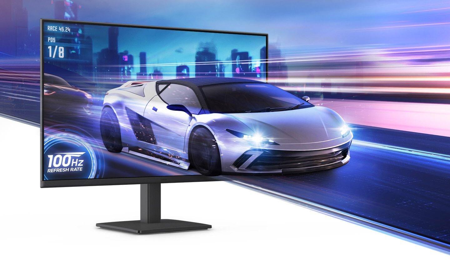Monitor wyświetla dynamiczny obraz samochodu sportowego na tle rozmytego miasta. Na ekranie widoczny jest napis \'100 Hz REFRESH RATE\'.