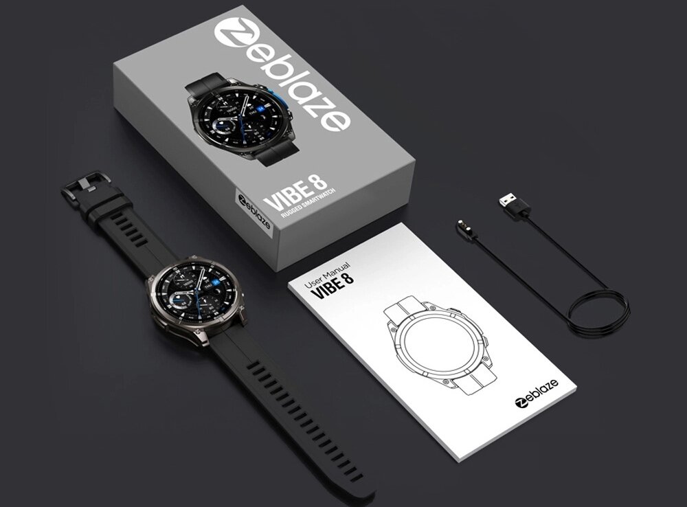 Na obrazie znajduje się smartwatch z czarnym paskiem, pudełko z napisem \'Zeblaze VIBE 8\', instrukcja obsługi oraz kabel USB. Logo \'Zeblaze\' widoczne jest na pudełku i instrukcji.