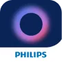 Logo przedstawia okrągły kształt z gradientem kolorów od niebieskiego do różowego na ciemnym tle. Pod spodem znajduje się napis \'PHILIPS\'.