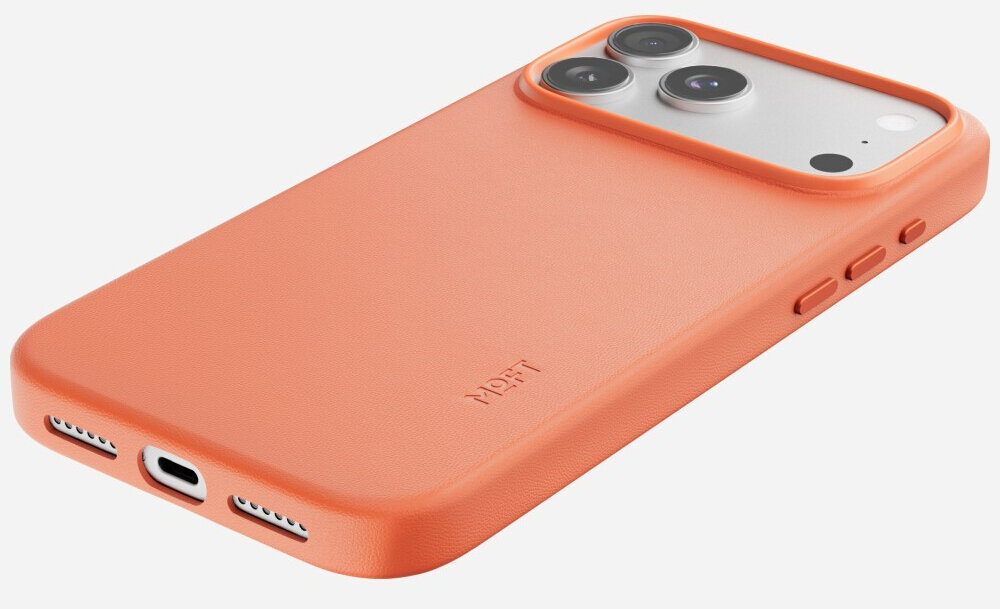 Pomarańczowe etui na telefon z trzema przyciskami bocznymi i wycięciem na aparat. Na etui widoczne jest logo \'MOFT\'.