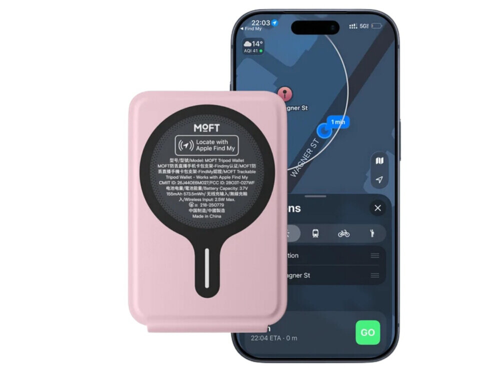 Różowy magnetyczny portfel MOFT z okrągłym czarnym elementem i tekstem, obok smartfon z mapą na ekranie. Na portfelu widoczny jest napis \'MOFT Locate with Apple Find My\'.