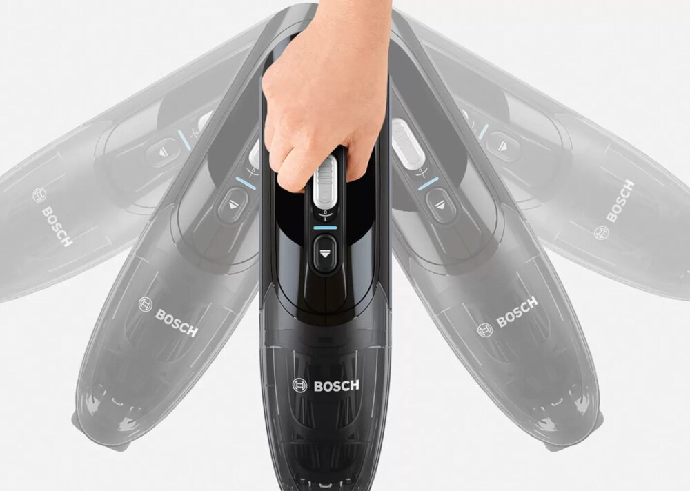 Na obrazie widoczny jest odkurzacz ręczny marki BOSCH z logo \'BOSCH\' na obudowie. Ręka trzyma urządzenie, a w tle widać kilka jego przezroczystych sylwetek, sugerujących ruch.