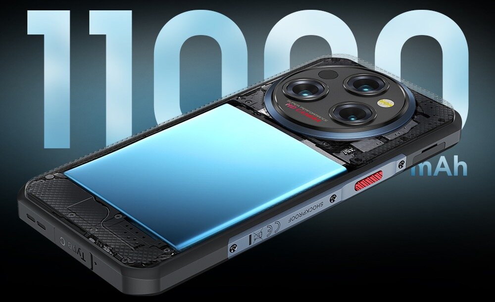 Obraz przedstawia smartfon z widocznym dużym napisem \'11000 mAh\' w tle. Telefon ma trzy obiektywy aparatu i widoczny napis \'SHOCKPROOF\' na boku obudowy.