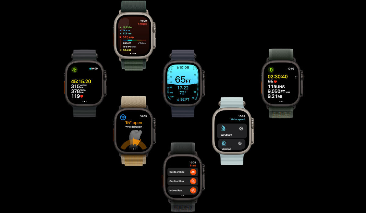 Na obrazie widocznych jest siedem smartwatchy z różnymi tarczami wyświetlającymi dane takie jak czas, wysokość, temperatura i aktywności. Każdy zegarek ma inny kolor paska i wyświetla różne informacje na ekranie.