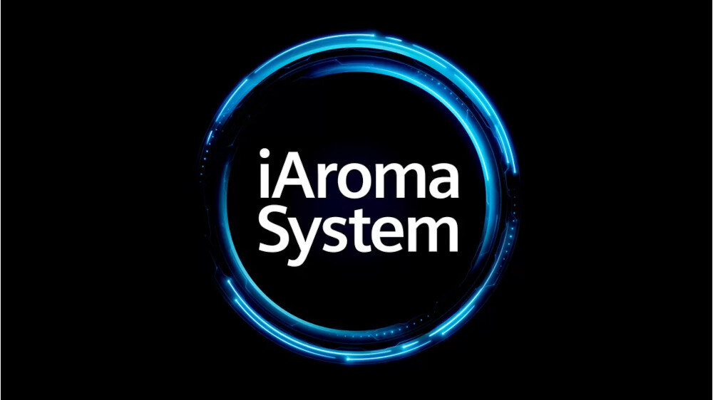 Na czarnym tle widoczny jest niebieski, świecący okrąg z napisem \'iAroma System\' w środku.