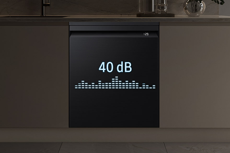 pracuje wyjątkowo cicho Zmywarka z wyświetlaczem pokazującym \'40 dB\' oraz graficzną reprezentacją poziomu hałasu. W górnym rogu widoczny jest czas \'1:29\'.