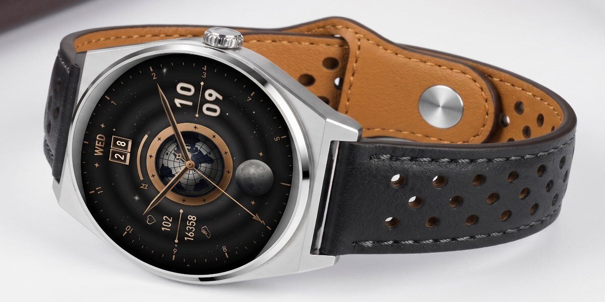 Smartwatch LUNA Uomo Czarny leżący na jasnej powierzchni.