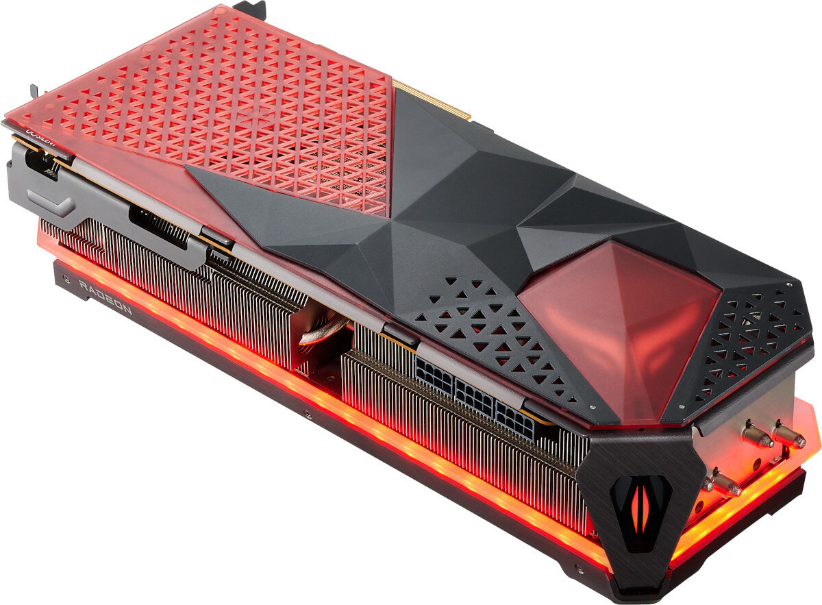 Karta graficzna z czarno-czerwonym obudowaniem i podświetleniem LED. Widoczne logo \'Radeon\' na boku urządzenia.