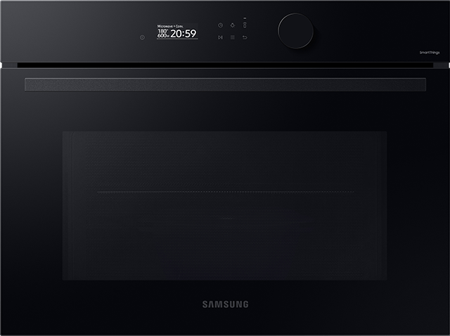 Tabelka porównująca specyfikację piekarników kompaktowych Samsung dostępnych w Media Expert Czarny piekarnik elektryczny z mikrofalą marki Samsung z wyświetlaczem pokazującym temperaturę 180°C i czas 20:59. Na froncie widoczne jest logo \'SAMSUNG\'.